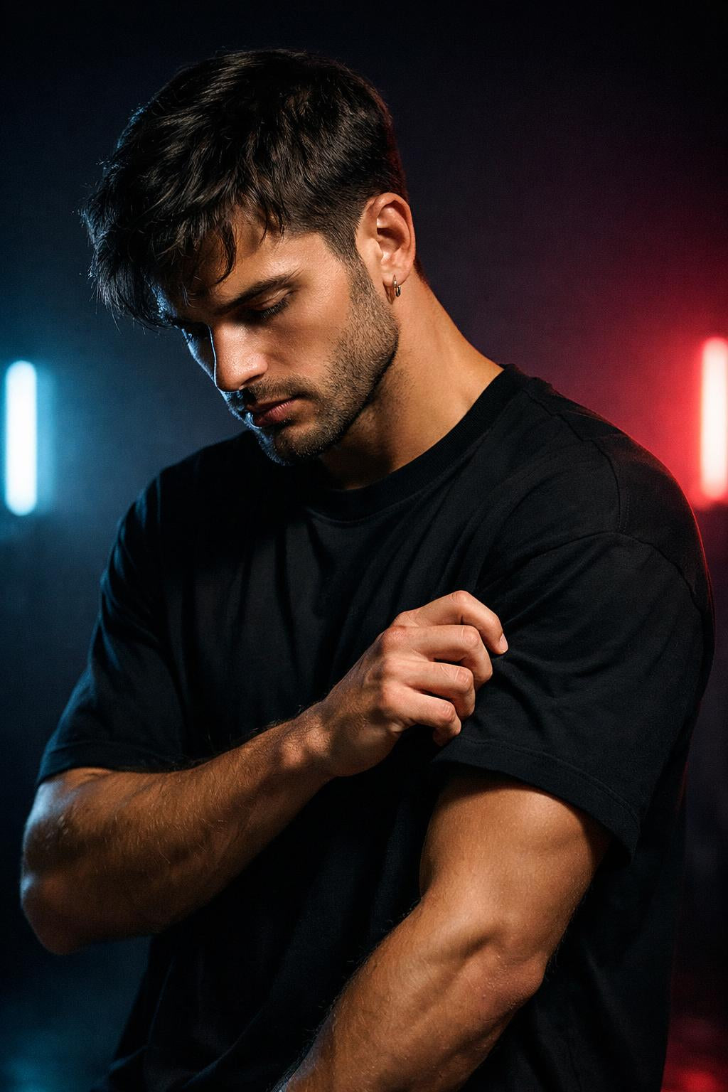 Male model in black streetwear t-shirt representing mindset and modern streetwear brand Vibzy Fit